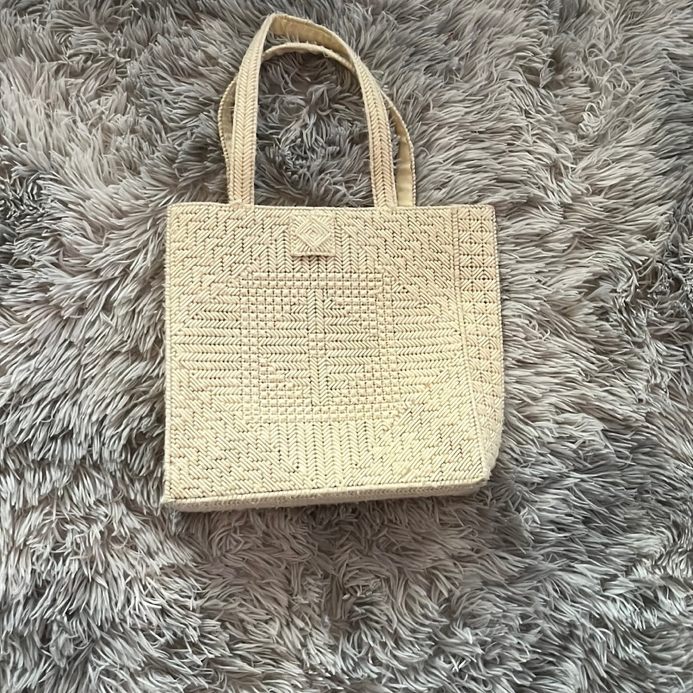 This white bag is super cute and handmade!